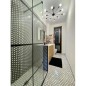 Mosaique salle de bain Dif octogone marbre blanc avec cabochon noir sur trame brillant 27x31x1cm, art-déco gatsby