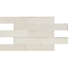 Carrelage imitation vieille brique blanc brillant nuancé pour le mur 7x28cm apegmurus nix
