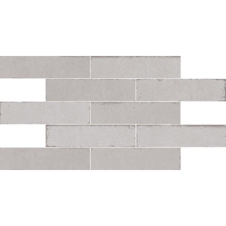 Carrelage imitation vieille brique gris clair brillant nuancé pour le mur 7x28cm apegmurus neve