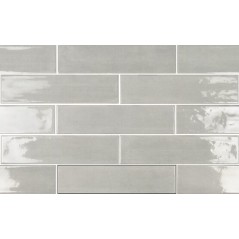 Carrelage imitation zellige gris clair brillant pour le mur posé à joint décalé 7.5x30cm apegmud grey